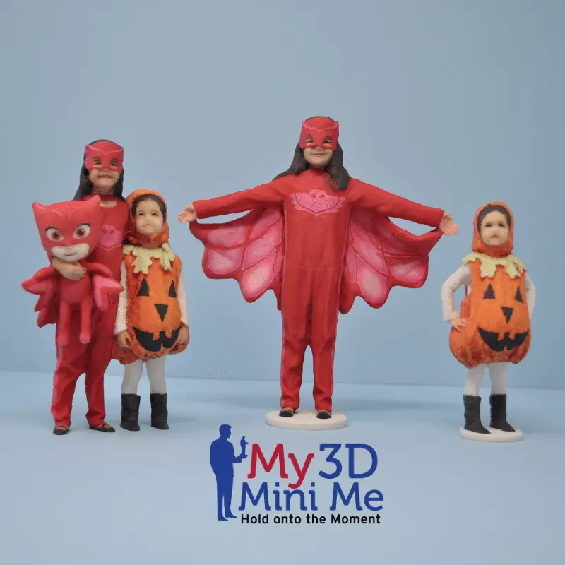 statues of little girls in costume made by My 3D Mini Me