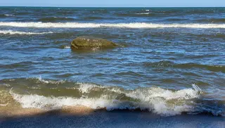 waves on Lake Michigan beach representing passion