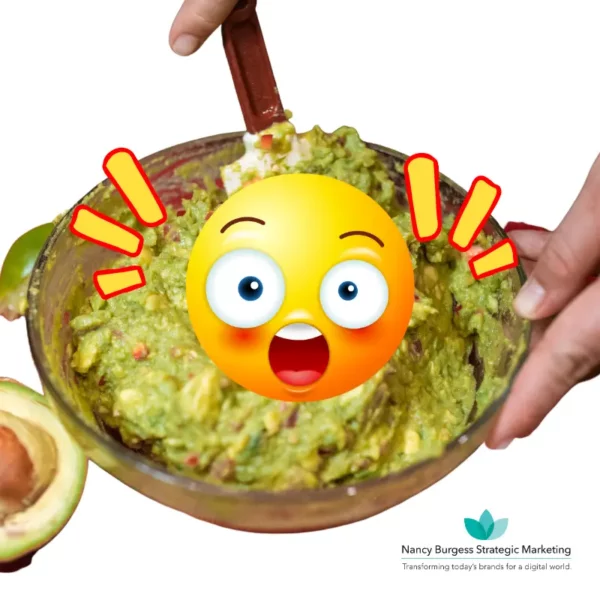 bowl of guacamole with a surprised face emoji